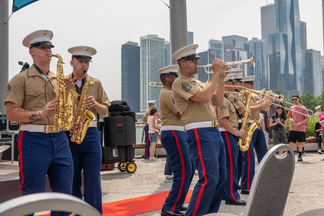 The Quantico Brass Band performs after the closing ceremony for Chicago Marine Week 2025 at the Navy Pier, Chicago, Illinois, July 13, 2025. Marines from around the Corps and the people of Chicago attended Marine Week Chicago to celebrate the Marine Corps’ 250th anniversary, which consisted of live performances, music, ceremonies, events, and displays of equipment, and aircraft.