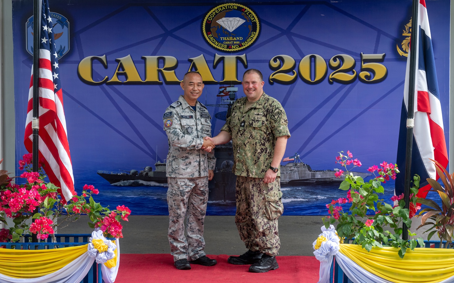 U.S. Navy Cmdr. Adam Ochs, commanding officer, USS Santa Barbara (LCS 32), gives remarks during the closing ceremony for Cooperation Afloat Readiness and Training (CARAT) Thailand 2025 at Sattahip Naval Base, Thailand, July 16, 2025. This year marks the 31st iteration of CARAT, a multinational exercise series designed to enhance U.S. and partner navies' abilities to operate together in response to traditional and non-traditional maritime security challenges in the Indo-Pacific region. (U.S. Marine Corps photo by Sgt. Mitchell Johnson)