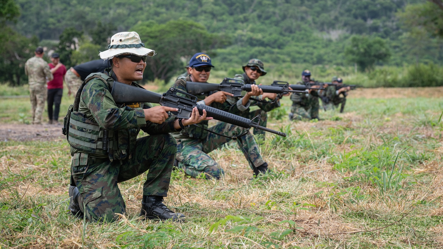 Royal Thai Navy explosive ordnance disposal (EOD) technicians practice patrolling techniques during Cooperation Afloat Readiness and Training (CARAT) Thailand 2025 in Pattaya, Thailand, July 14, 2025. This year marks the 31st iteration of CARAT, a multinational exercise series designed to enhance U.S. and partner navies' abilities to operate together in response to traditional and non-traditional maritime security challenges in the Indo-Pacific region. (U.S. Marine Corps photo by Sgt. Mitchell Johnson)