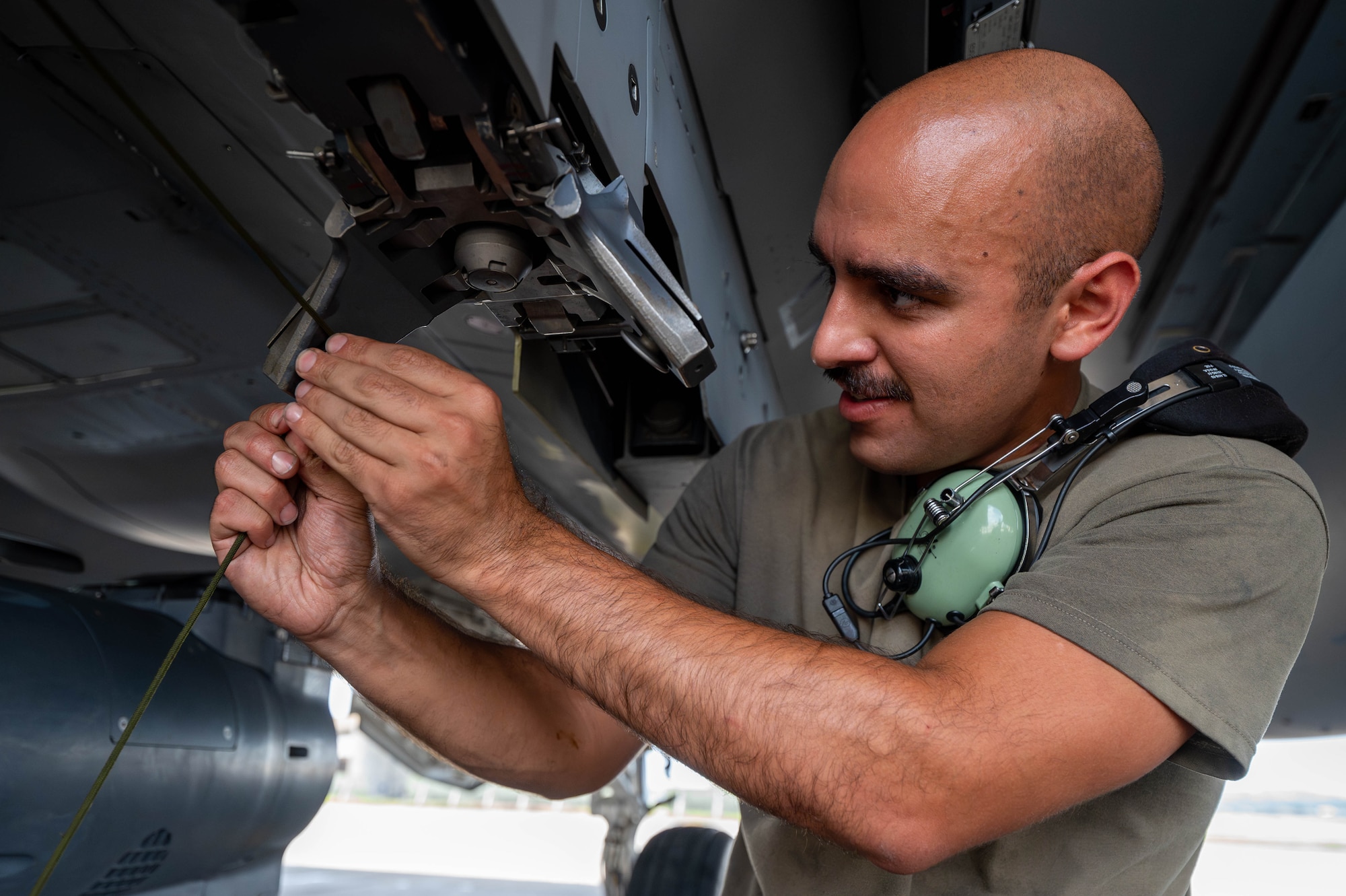 U.S. Air Force Senior Airman Josue Barban, assistant dedicated crew chief assigned to the 96th Aircraft Maintenance Squadron, Eglin Air Force Base, Florida, conducts post flight checks on an F-15EX Eagle II at Kadena Air Base, Japan, July 16, 2025.