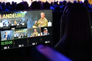 U.S. Army Brig. Gen. Steven P. Carpenter engages in panel discussion with other military and industry leaders during LANDEURO 2025 in Wiesbaden, Germany, July 17, 2025. The discussion highlighted collaboration, innovation, and future capabilities in land power operations. (U.S. Army photo by Staff Sgt. Rajheem Dixon/2nd Multi Domain Task Force)