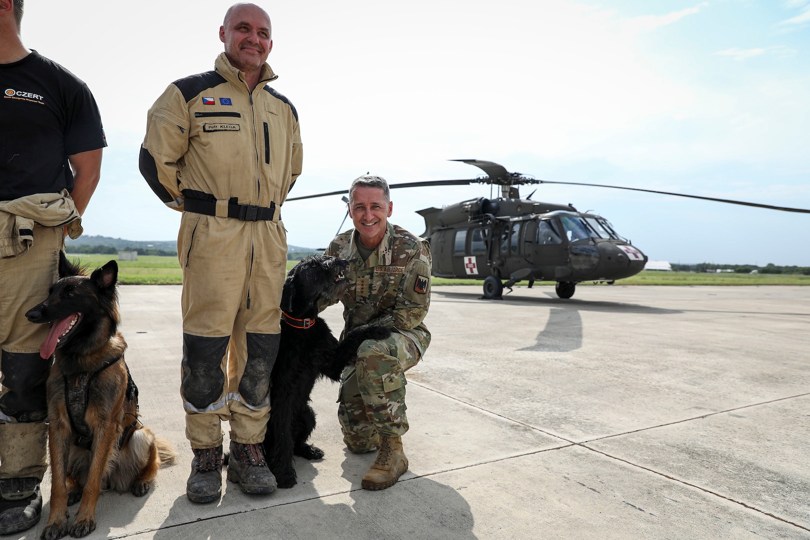 Air Force Gen. Steve Nordhaus, 30th Chief of the National Guard Bureau, and Senior Enlisted Advisor John Raines, SEA to the CNGB, join Texas Gov. Greg Abbott and Air Force Maj. Gen. Thomas Suelzer, the adjutant general of Texas, for an aerial assessment of flood-affected areas in Central Texas and to visit Guardsmen on duty supporting civil authorities with response efforts, Kerrville, Texas, July 15, 2025.