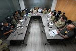 Members of the U.S. military, Servicio Nacional Aeronaval of Panama, Policia Nacional de Panama, and Servicio Nacional de Fronteras collaborate to plan jungle training curriculum in Panama City, Panama, on July 15, 2025. During this meeting, a tentative schedule for jungle training was agreed upon, utilizing the combined expertise of jungle survival trainers from both countries. The U.S. has a longstanding bilateral security partnership with Panama that reflects its mutual trust, recognition of, and respect for Panama's sovereignty, and values the commitment of our Panamanian security partners and their steadfast support to regional cooperation against shared threats and security challenges. (U.S. Air Force photo by Senior Airman Justin Todd)