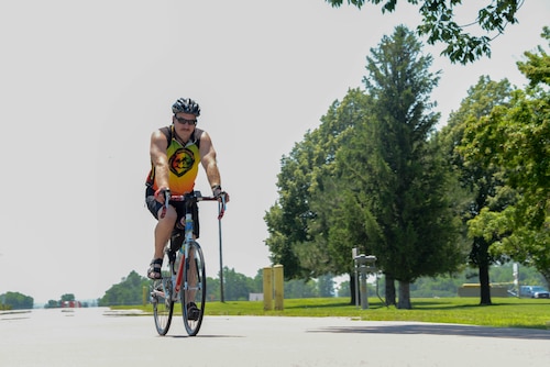 Tech. Sgt. Anthony O’Tool, a 185th Air Refueling Wing fuels management specialist, rides his bicycle