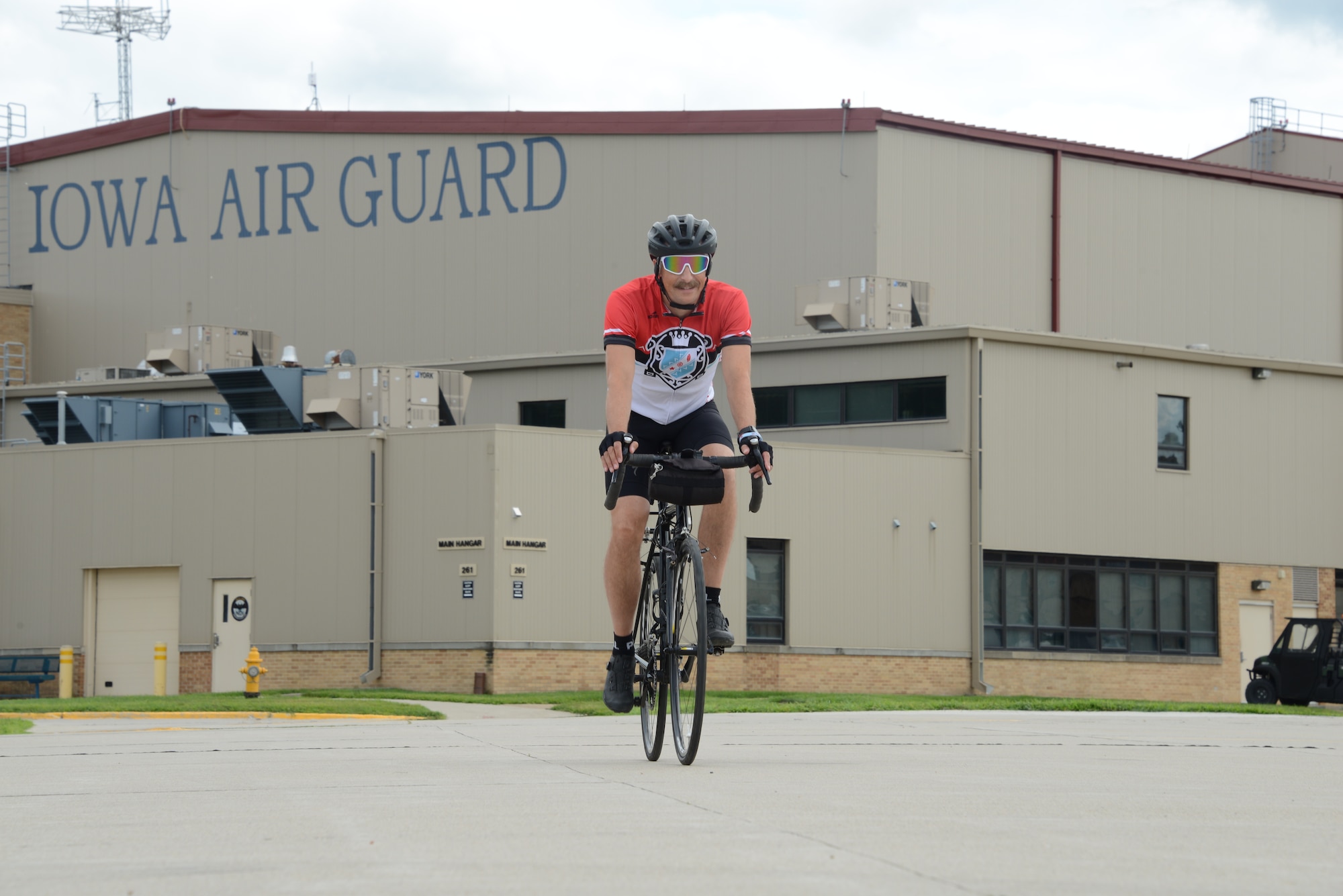 Master Sgt. Jason Smith, 185th Air Refueling Wing Inspector General Office Inspection Coordinator, rides his bicycle