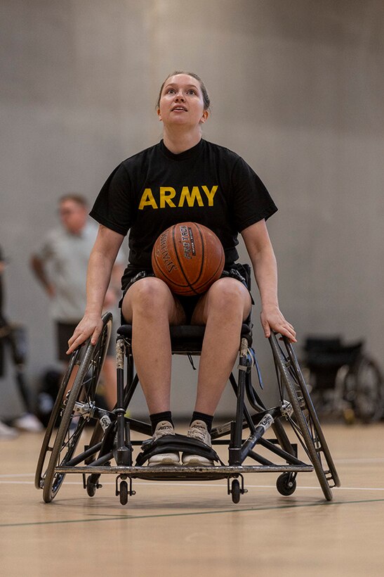 U.S. Army Capt. Samantha Frey runs drills at wheelchair basketball practice during the 2025 Department of Defense Warrior Games practice sessions at Fort Carson, Colorado, July 14, 2025.