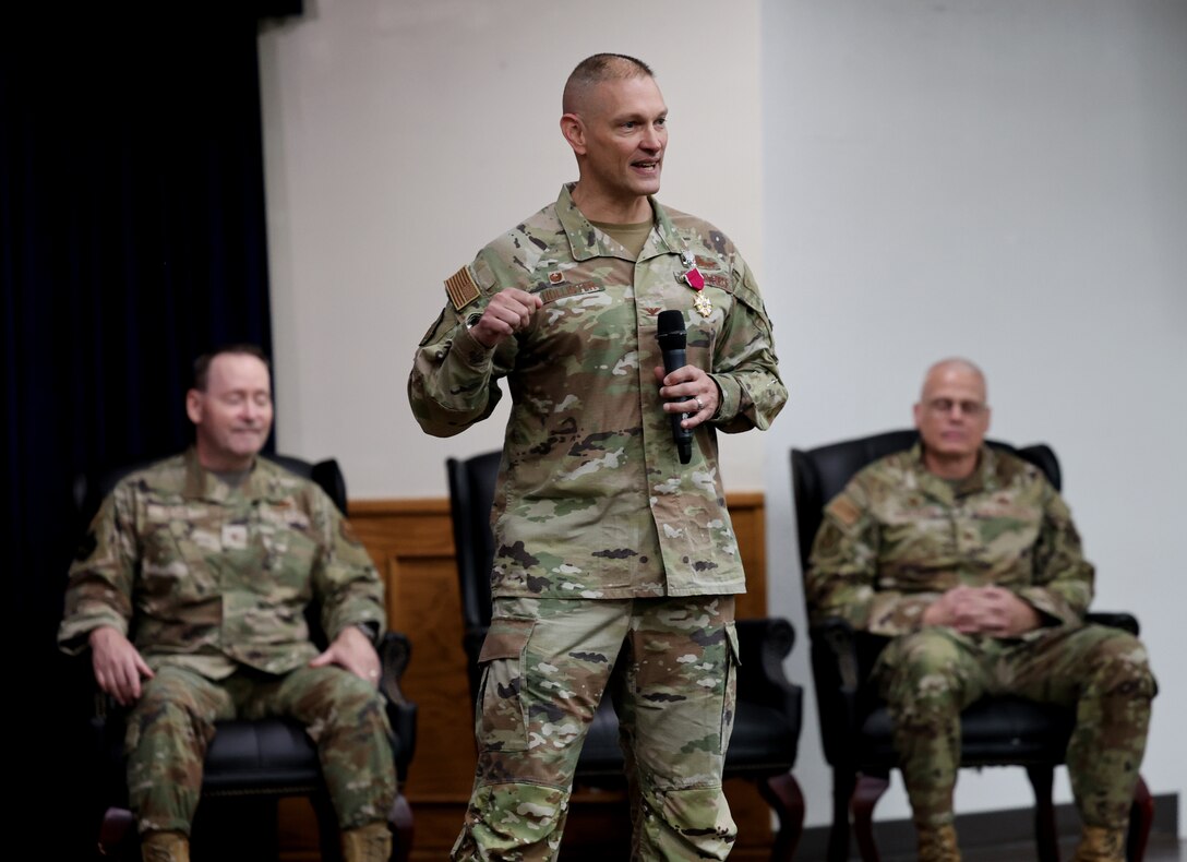 Col. John Hollister delivers his final remarks as commander of the 82nd Mission Support Group during a change of command ceremony