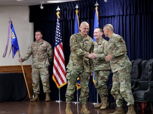 Outgoing 82nd Mission Support Group Commander Col. John Hollister shakes hands with incoming commander Col. Kenneth Raszinski