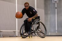 U.S. Army Staff Sgt. Allaijah Churchwell conducts drills at wheelchair basketball practice during the 2025 Department of Defense Warrior Games practice sessions at Fort Carson, Colorado, July 14, 2025.