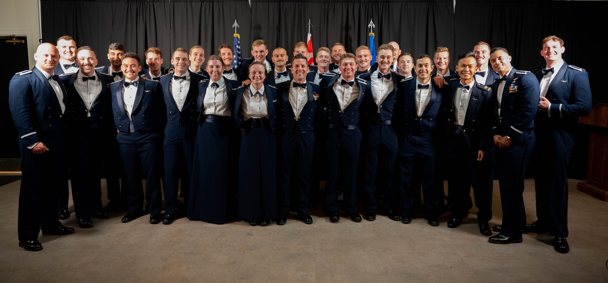 U.S. Air Force and Singaporean pilots from graduating class 25-12 pose for a group photo at Laughlin Air Force Base, Texas, July 17, 2025.  Class 25-12 consisted of 28 students from the United States and Singapore. (U.S. Air Force photo by Airman 1st Class Darryl Keith.)
