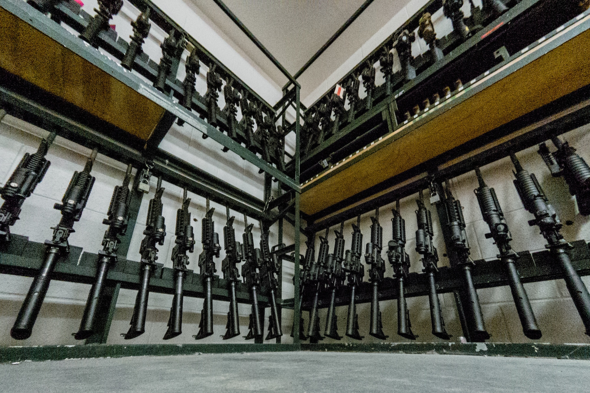 M4 rifles are seen in racks at an armory at Holloman Air Force Base, New Mexico.
