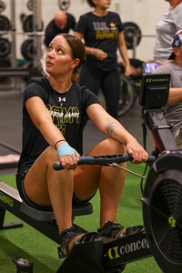 U.S. Army Spc. Avery Short receives instructions from a coach at indoor rowing practice during the 2025 Department of Defense Warrior Games practice sessions at Fort Carson, Colorado, July 13, 2025.