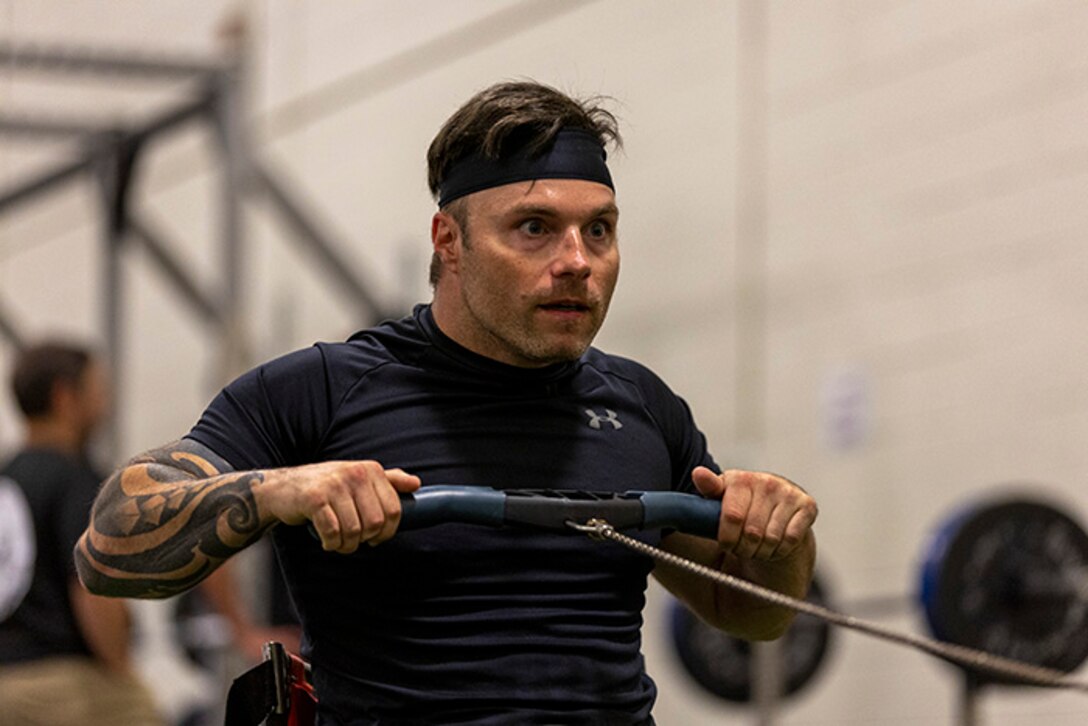 U.S. Army veteran JP Lane conducts drills at indoor rowing practice during the 2025 Department of Defense Warrior Games at Fort Carson, Colorado, July 13, 2025.