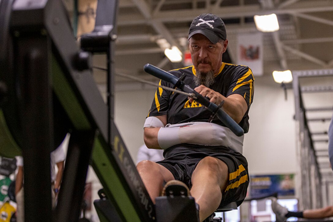 U.S. Army veteran Jeremy Ditlevson warms up at indoor rowing practice during the 2025 Department of Defense Warrior Games at Fort Carson, Colorado, July 13, 2025.