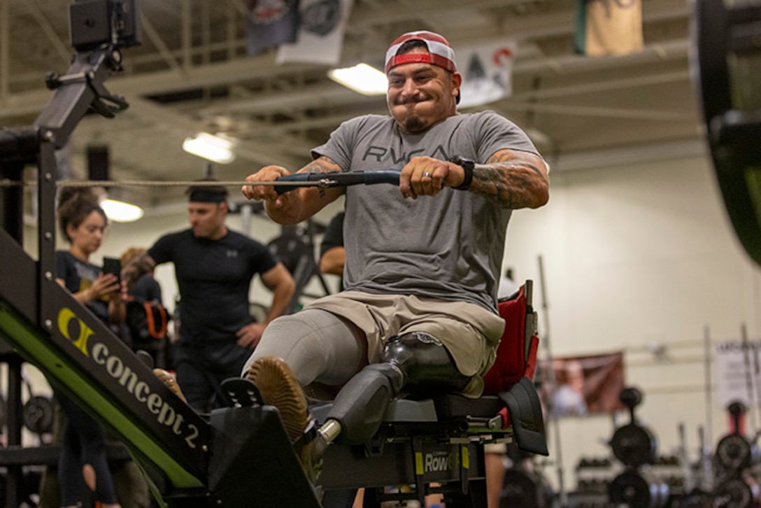 U.S. Army veteran Jason Smith warms up at indoor rowing practice during the 2025 Department of Defense Warrior Games at Fort Carson, Colorado, July 13, 2025.