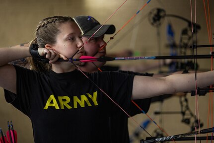 U.S. Army Capt. Samantha Frey draws her bow at archery practice during the 2025 Department of Defense Warrior Games at Fort Carson, Colorado, July 13, 2025.