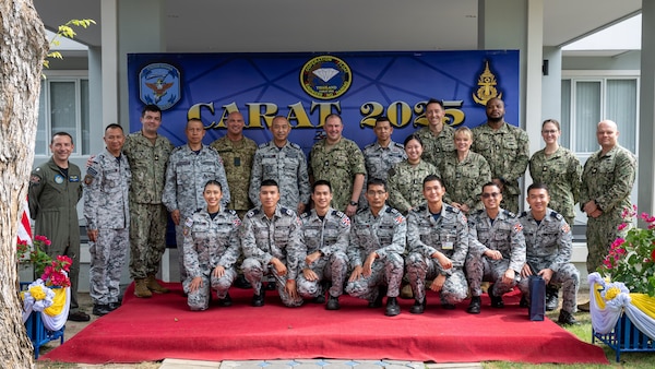Capt. Samart Srimoung, Royal Thai Navy, gives remarks during the closing ceremony for Cooperation Afloat Readiness and Training (CARAT) Thailand 2025 at Sattahip Naval Base, Thailand, July 16, 2025. This year marks the 31st iteration of CARAT, a multinational exercise series designed to enhance U.S. and partner navies' abilities to operate together in response to traditional and non-traditional maritime security challenges in the Indo-Pacific region. (U.S. Marine Corps photo by Sgt. Mitchell Johnson)