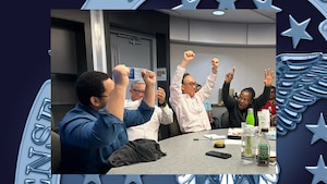 People celebrate during game