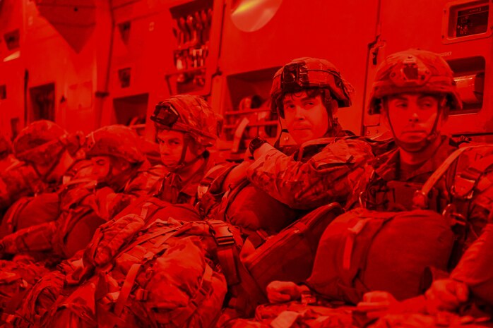 U.S. Army paratroopers assigned to the 2nd Infantry Brigade Combat Team (Airborne), 11th Airborne Division, prepare to jump from a C-17 Globemaster assigned to the 154th Operations Wing in support of exercise Talisman Sabre 2025 near Queensland, Australia, July 13, 2025.