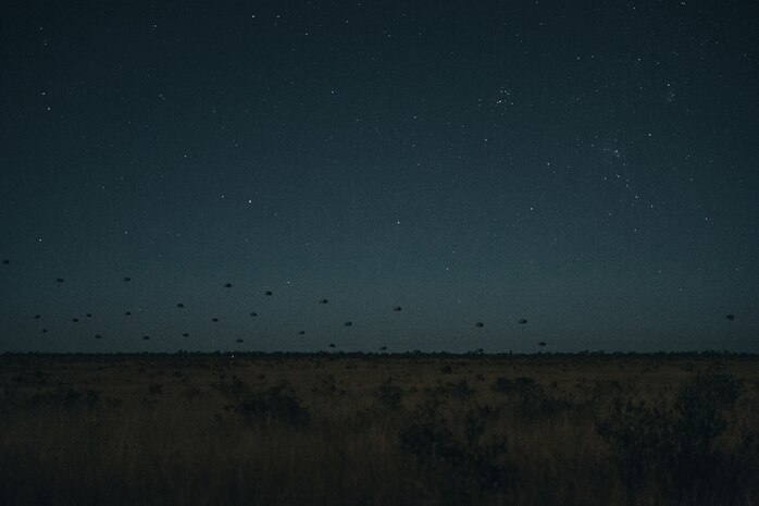 Paratroopers from the United States Army, French Armed Forces and German Army conduct an airborne insertion at night into the Charters Towers region, during Exercise Talisman Sabre. Talisman Sabre is the largest bilateral military exercise between Australia and the United States advancing a free and open Asia-Pacific by strengthening relationships and interoperability among key allies and partners, while enhancing our collective capabilities to respond to a wide array of potential security concerns.