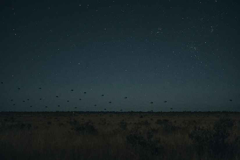 Paratroopers from the United States Army, French Armed Forces and German Army conduct an airborne insertion at night into the Charters Towers region, during Exercise Talisman Sabre. Talisman Sabre is the largest bilateral military exercise between Australia and the United States advancing a free and open Asia-Pacific by strengthening relationships and interoperability among key allies and partners, while enhancing our collective capabilities to respond to a wide array of potential security concerns.