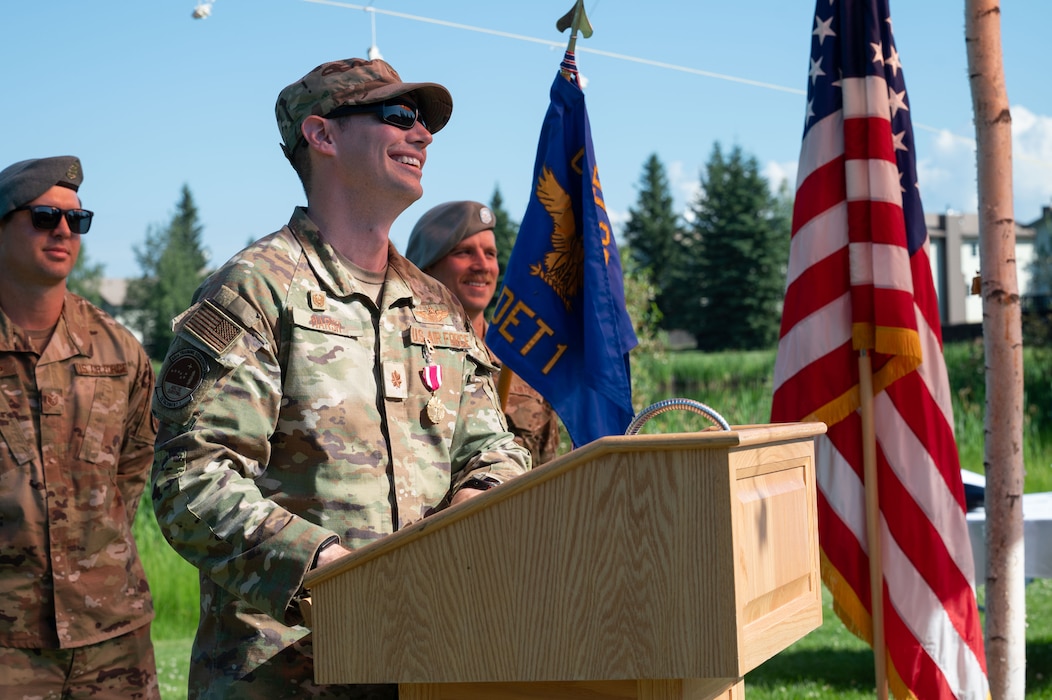 U.S. Air Force Maj. Kaleb Marsh, Detachment 1, 66th Training Squadron outgoing commander, delivers a speech during a change of command ceremony at Eielson Air Force Base, Alaska, July 18, 2025.