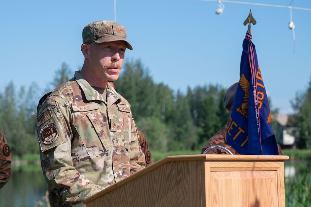 U.S. Air Force Maj. Gordon Blair, Detachment 1, 66th Training Squadron incoming commander, delivers a speech during a change of command ceremony at Eielson Air Force Base, Alaska, July 18, 2025.