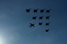 U.S. Navy aircraft, attached to Carrier Air Wing (CVW) 5, fly over U.S. Navy George Washington Carrier Strike Group, as it participates in dual carrier operations alongside Royal Navy HMS Prince of Wales Carrier Strike Group while underway in the Timor Sea, as part of Talisman Sabre, July 18, 2025.