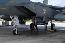 U.S. Air Force Staff Sgt. Paul McManus, 96th Aircraft Maintenance Squadron dedicated crew chief, conducts post flight checks on an F-15EX Eagle II assigned to the 85th Test and Evaluation Squadron, Eglin Air Force Base, Florida, at Kadena Air Base, Japan, July 16, 2025.