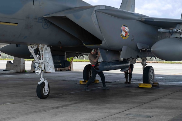 U.S. Air Force Staff Sgt. Paul McManus, 96th Aircraft Maintenance Squadron dedicated crew chief, conducts post flight checks on an F-15EX Eagle II assigned to the 85th Test and Evaluation Squadron, Eglin Air Force Base, Florida, at Kadena Air Base, Japan, July 16, 2025.