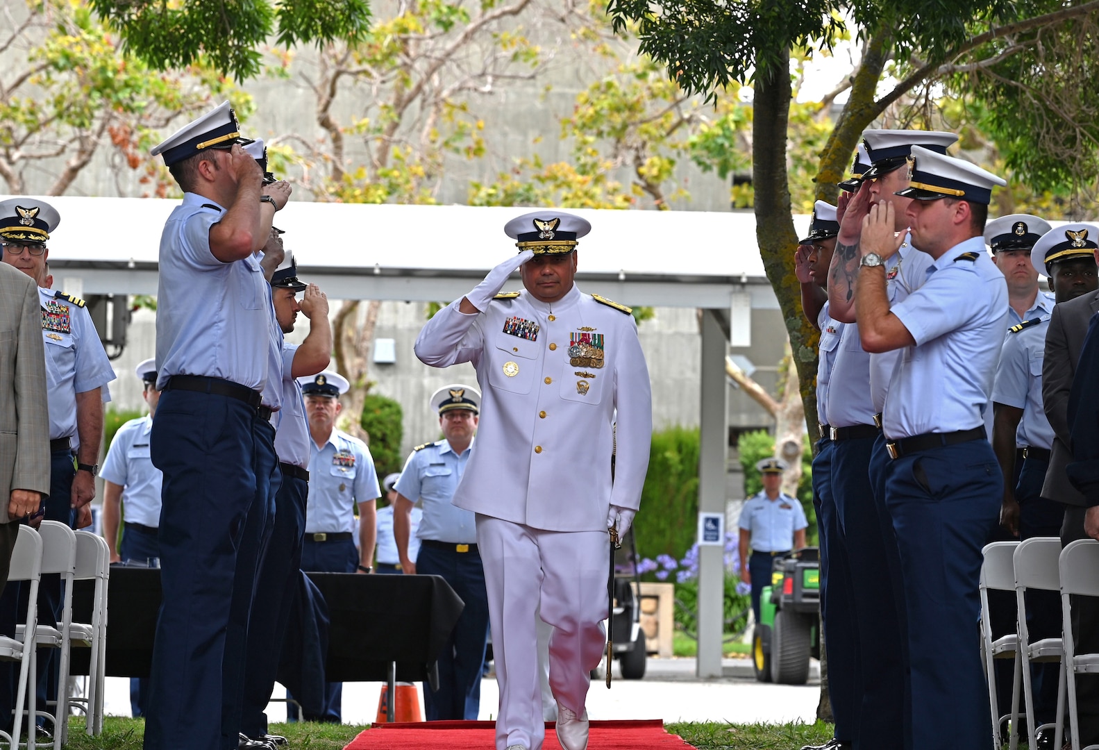 Vice Adm. Andrew Tiongson, commander, U.S. Coast Guard Pacific Area, renders a salute during his retirement ceremony at Coast Guard Base Alameda, California, July 18, 2025. Adm. Kevin Lunday, the Coast Guard’s acting commandant, presided over the ceremony in which Tiongson retired following 40 years of honorable service. (U.S. Coast Guard photo by Petty Officer 3rd Class Joel LaVallee)
