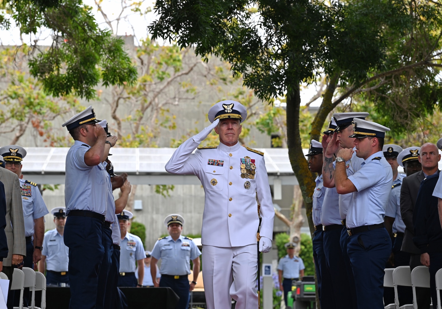 Adm. Kevin Lunday, the Coast Guard’s acting commandant, renders a salute during Vice Adm. Andrew Tiongson's, commander, U.S. Coast Guard Pacific Area, retirement ceremony at Coast Guard Base Alameda, California, July 18, 2025. Lunday presided over the ceremony in which Tiongson retired following 40 years of honorable service. (U.S. Coast Guard photo by Petty Officer 3rd Class Joel LaVallee)