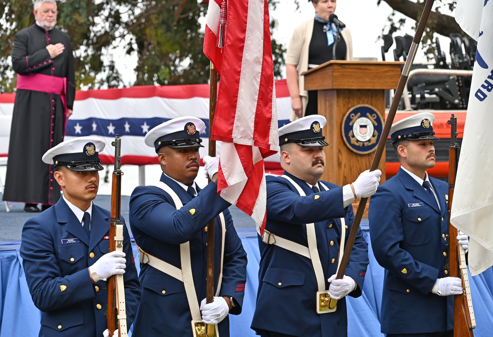 The color guard presents the American flag during a retirement ceremony held at Coast Guard Base Alameda, California, July 18, 2025. Adm. Kevin Lunday, the Coast Guard’s acting commandant, presided over the ceremony in which Vice Adm. Andrew Tiongson, commander, U.S. Coast Guard Pacific Area, retired following 40 years of honorable service. (U.S. Coast Guard photo by Petty Officer 3rd Class Joel LaVallee)