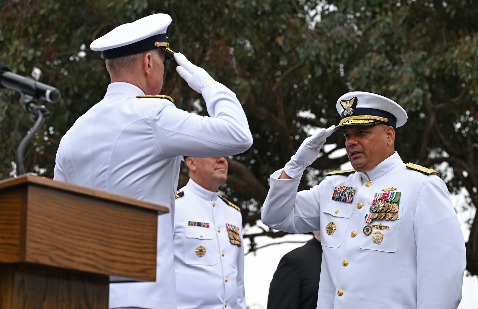 Vice Adm. Andrew Tiongson, commander, U.S. Coast Guard Pacific Area, renders a salute during his retirement ceremony at Coast Guard Base Alameda, California, July 18, 2025. Adm. Kevin Lunday, the Coast Guard’s acting commandant, presided over the ceremony in which Tiongson retired following 40 years of honorable service. (U.S. Coast Guard photo by Petty Officer 3rd Class Joel LaVallee)
