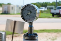 Photo of a differential pressure gauge at Dyess Air Force Base, Texas, July 8, 2025. The 7th Bomb Wing is in the final phase of a $24 million modernization project to overhaul Dyess’ fueling infrastructure—a multi-year initiative designed to improve efficiency and enhance operational readiness across the installation. (U.S. Air Force photo by Senior Airman Emma Anderson)