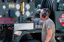 U.S. Air Force Senior Airman Jerry Moore, 7th Logistics Readiness Squadron fuels distribution operator, monitors gauges on an R-12 hydrant refueling truck during a hot pit refuel at Dyess Air Force Base, Texas, July 8, 2025. The 7th Bomb Wing is in the final phase of a four-year project to modernize its primary fueling system –doubling refueling capacity and enhancing mission readiness across the base. (U.S. Air Force photo by Airman 1st Class Adrien Tran)