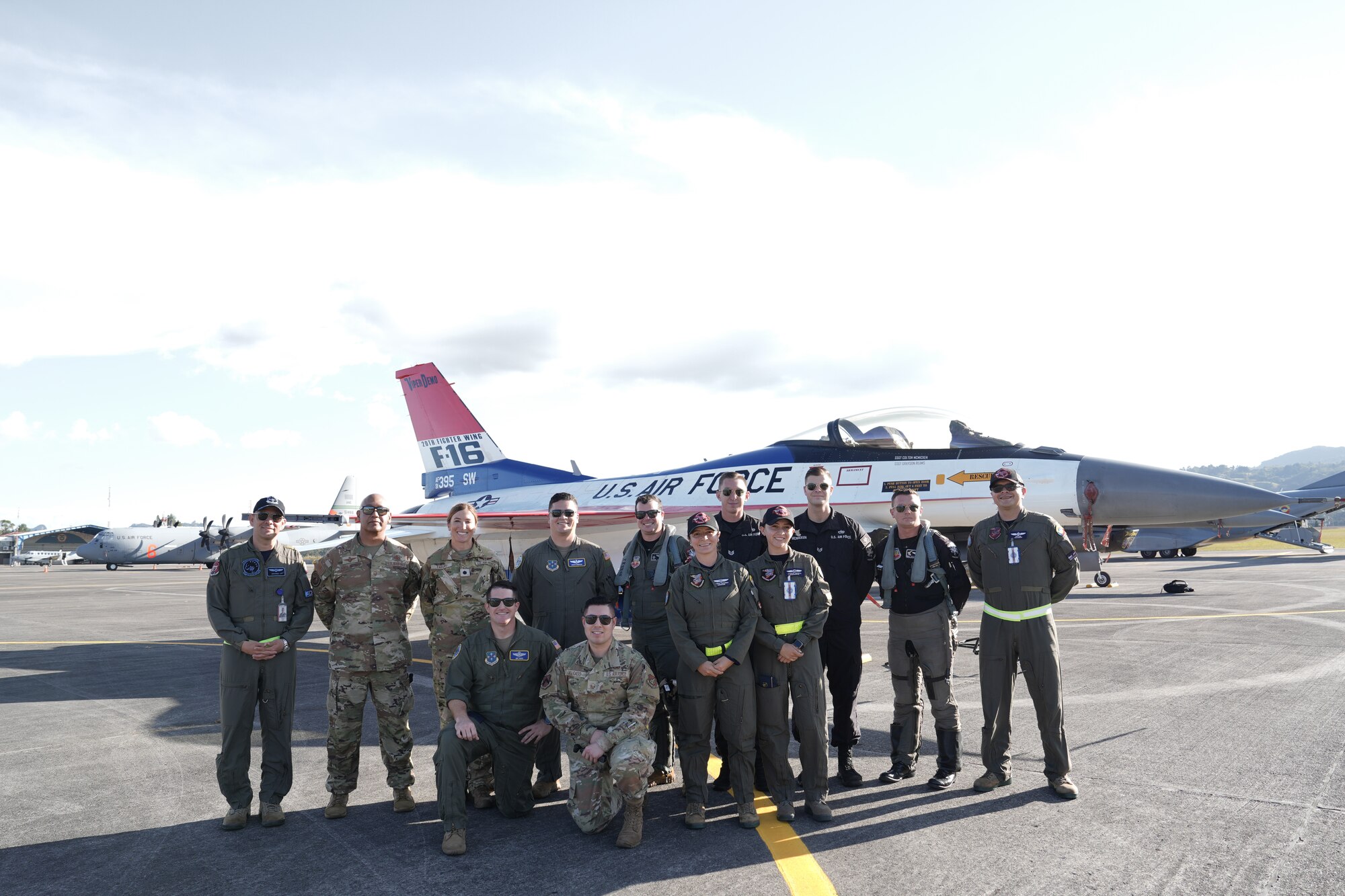 Members of the U.S. Air Force and the Colombian Air Force pose for a photo in front of an F-16 Fighting Falcon flown by Maj. Taylor "FEMA" Hiester at José María Córdova International Airport before the F-AIR 2025 air show in Rionegro, Antioquia, Colombia, July 7, 2025. U.S. Air Force participation in F-AIR 2025 strengthens military-to-military relationships with regional partners. (U.S. Air Force photo by Staff Sgt. Ariel O'Shea)