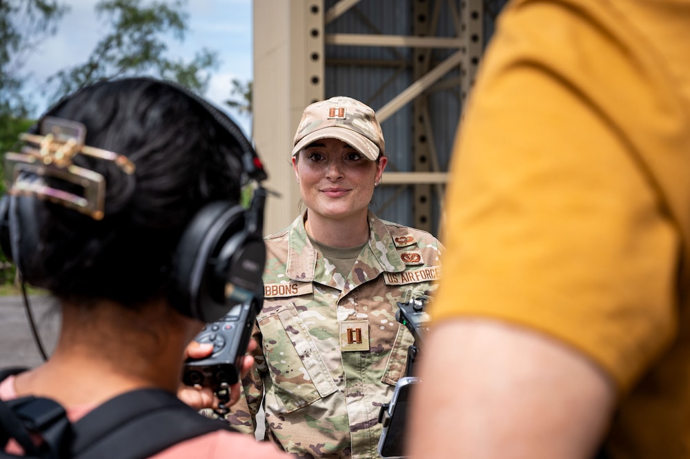 U.S. Air Force Captain gets interviewed by local media for exercise Resolute Force Pacific