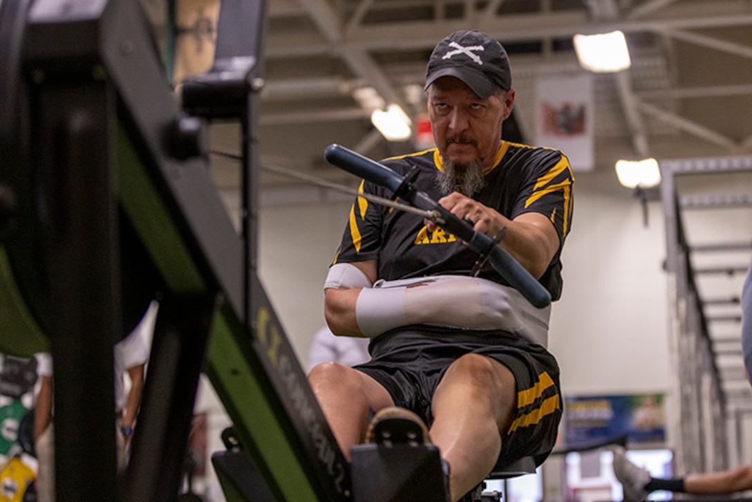 U.S. Army veteran Jeremy Ditlevson warms up at indoor rowing practice during the 2025 Department of Defense Warrior Games at Fort Carson, Colorado, July 13, 2025.