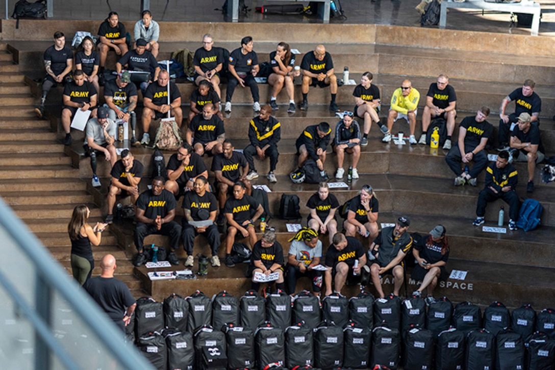 Team Army Athletes wait to receive team uniforms for events during the 2025 Department of Defense Warrior Games at Colorado Springs, Colorado, July 15, 2025.