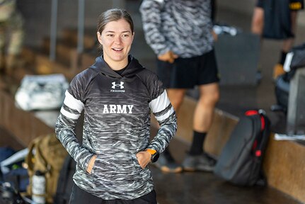 U.S. Army Sgt. Bianca Hayden tries on her new hooded sweatshirt at the Team Army uniform issue during the 2025 Department of Defense Warrior Games at Colorado Springs, Colorado, July 15, 2025.