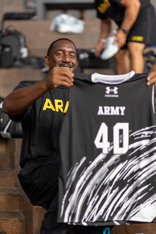 U.S. Army Master Sgt. Earlie Brown shows off his Team Army uniform during the 2025 Department of Defense Warrior Games at Colorado Springs, Colorado, July 15, 2025.