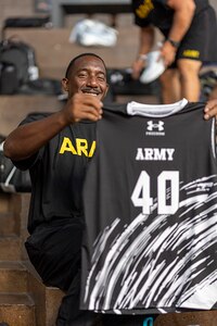 U.S. Army Master Sgt. Earlie Brown shows off his Team Army uniform during the 2025 Department of Defense Warrior Games at Colorado Springs, Colorado, July 15, 2025.