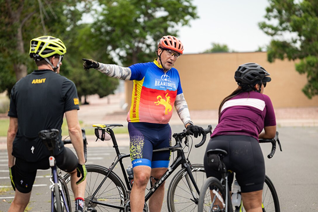 Team Army coach Greg Miller speaks to athletes during familiarization and cycling practice during the 2025 Department of Defense Warrior Games training camp at Fort Carson, Colorado, July 15, 2025.