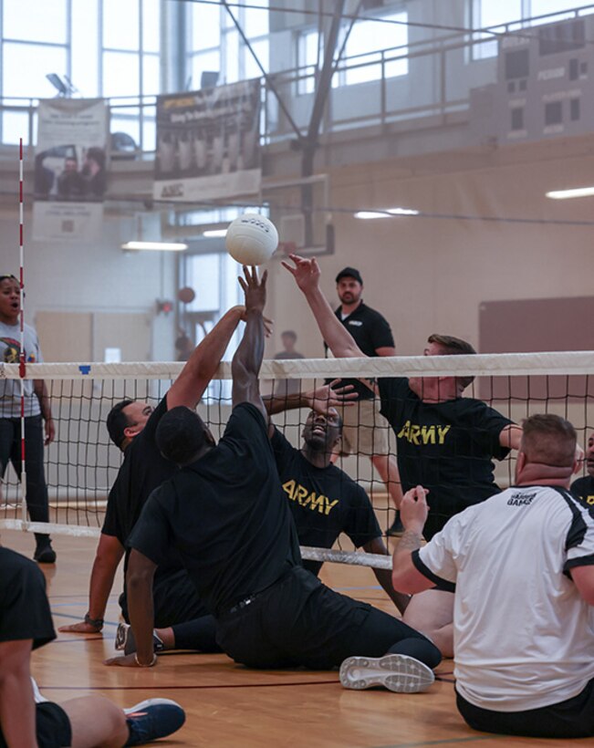Team Army athletes participate in sitting volleyball practice during the 2025 Department of Defense Warrior Games training camp at Fort Carson, Colorado, July 15, 2025.
