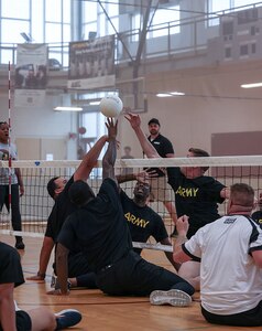 Team Army athletes participate in sitting volleyball practice during the 2025 Department of Defense Warrior Games training camp at Fort Carson, Colorado, July 15, 2025.