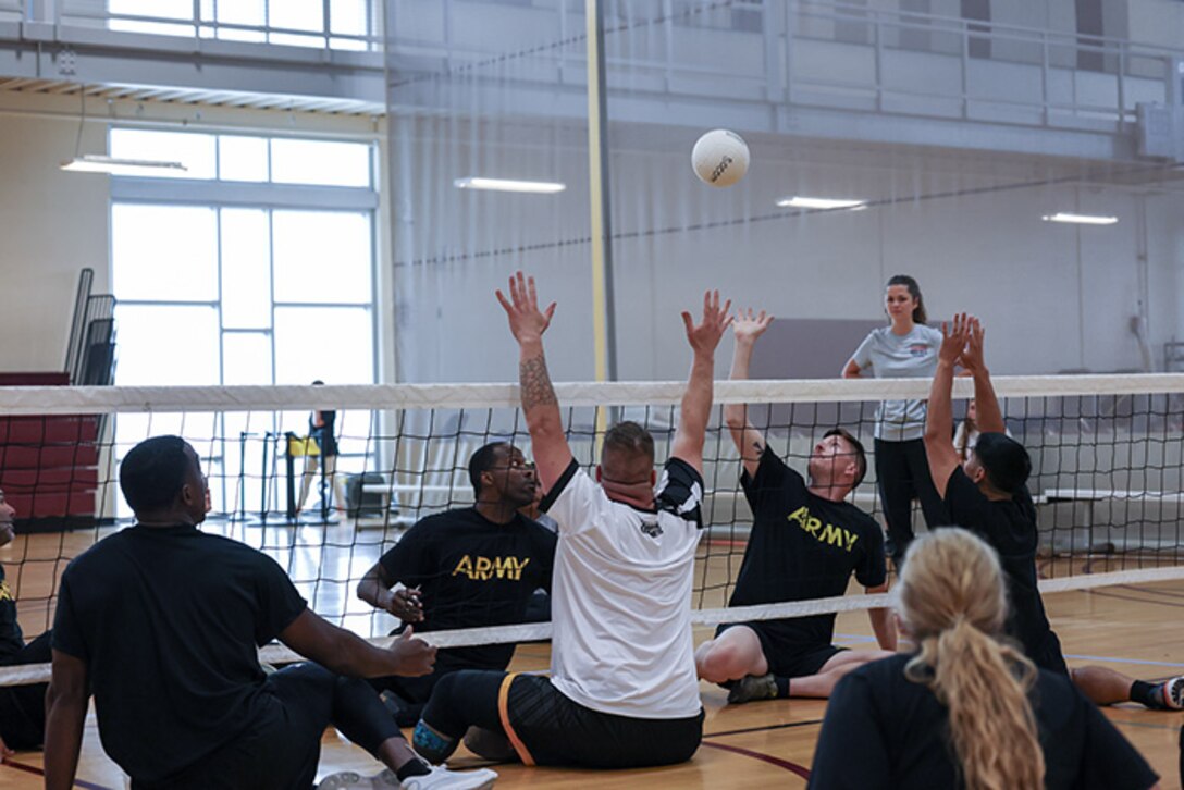 Team Army athletes participate in sitting volleyball practice during the 2025 Department of Defense Warrior Games training camp at Fort Carson, Colorado, July 15, 2025.Team Army athletes participate in sitting volleyball practice during the 2025 Department of Defense Warrior Games training camp at Fort Carson, Colorado, July 15, 2025.
