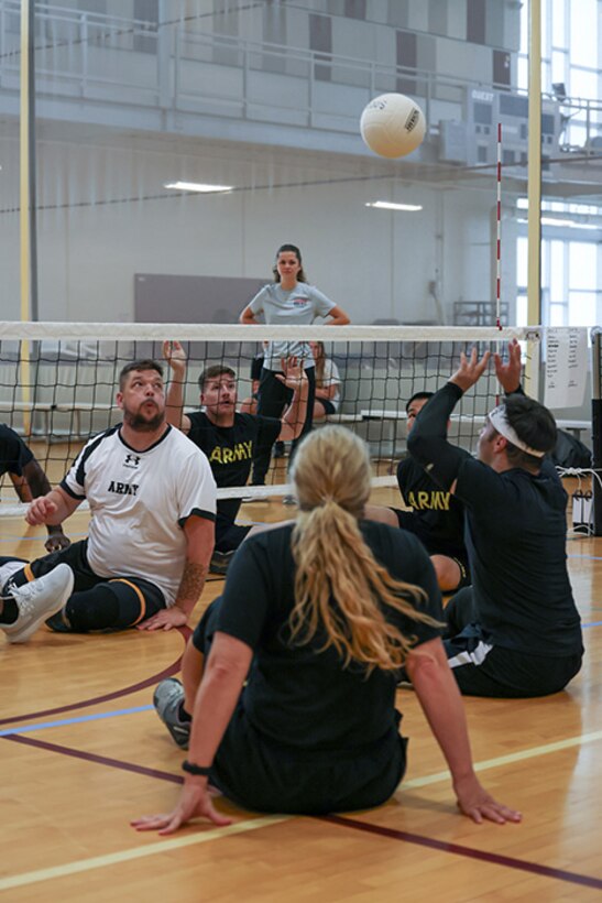 Team Army athletes participate in sitting volleyball practice during the 2025 Department of Defense Warrior Games training camp at Fort Carson, Colorado, July 15, 2025.