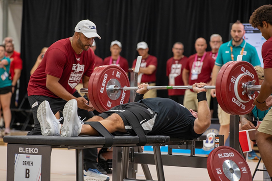 U.S. Army 1st Sgt. Christopher Morago pushes up an attempted rep at the powerlifting event during the 2025 Department of Defense Warrior Games at Reid Arena, Colorado Springs, Colorado, July 18, 2025.