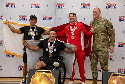 U.S. Army Col. Christopher Leung, left, U.S Army Retired Sgt. Jason Smith, center, U.S. Marine Corps Lance Cpl. Dakota Shaffer, and U.S. Army Sgt. Maj. Christopher Carey, the Deputy Chief of Staff Sergeant Major.